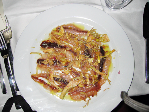 Thinly sliced cured Italian mackerel from our shores with artichoke marinade.