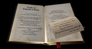 A book with a light on it AI-generated content may be incorrect.
