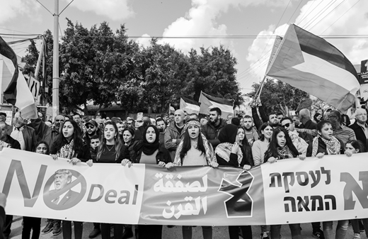 Palestinian protesters in the northern Israeli town of Baqa al-Gharbiyya demonstrate against U.S. president Donald Trump's so-called deal of the century. The Trump administration's “peace plan” has been unanimously rejected by Palestinians (see Palestine Unbound in this issue). (1 February, Ahmad Gharabli/AFP via Getty Images Images)