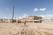 Pista de baile del club “Las Vegas”, 2016, color print on cotton paper, 120 x 180 cm. Transgender sex worker, Osiris, standing on the dance floor of a demolished club in Ciudad Juárez, Mexico (photograph provided by the artist and Galerie Peter Kilchmann, Zurich)