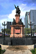 Charles Cordier, Monumento a Colón, 1873−77, bronze. Formerly at the Glorieta de Colón, Paseo de la Reforma, Mexico City, sculptures currently in storage (photograph by ProtoplasmaKid, Wikimedia Commons, licensed under the Creative Commons Attribution-Share Alike 4.0 international license)