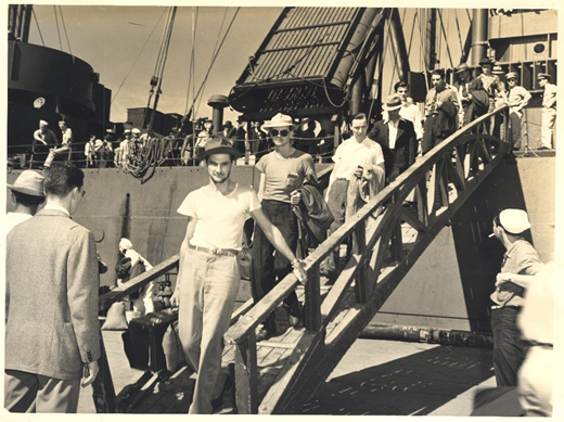“New Navy Yard workers arrive by ship.” Published in Honolulu Star Bulletin, 26 March 1943, p. 10: “Here we come. Men from every state in the Union stream down the gangplank to join the men behind the guns. Most of them will work at the Pearl Harbor navy yard.” Source: Series: Civilian Housing Area III (CHA III) 1942–1946, Box 4 FF 8 CHA III: Development and facilities. Cat. no. CHAIII 02, Robert F. Walden Collection (1936–1991), University of Hawai‘i at Mānoa Library.