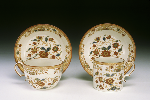 The English pearlware saucers, teacup, and coffee cup Richard and Ruth Hatch used to decorate their apartment in the Ashley House. Source: Tea set, Wedgwood & Co., Staffordshire, England, 1805–15. Lead glazed, refined white earthenware (pearlware) with underglaze cobalt blue enamel, transfer printing, overglaze iron-orange enamel, and gilding. (Historic Deerfield, Deerfield, Massachusetts, Gift of John B. Morris, 0913. Photo by Penny Leveritt)